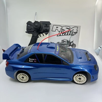 Subaru HPI Racing RS4 Rally 1/10 con control remoto, batería y manual original funcionando Foto 1 de 4