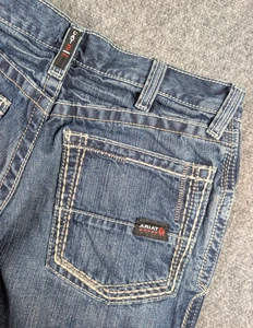 Ariat FR M4 Relaxed Boot Jeans Mens 31/30 Med Wash Denim Western Workwear - Picture 1 of 12