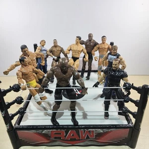 WWE Raw Wrestling Spring Loaded Ring With 10 Wrestling Figures - Picture 1 of 17