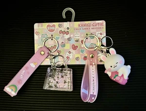 Schöner Liquid Shaky Kawaii Cutie Schlüsselanhänger Blase 2er Set Neu - Bild 1 von 3