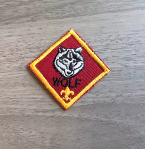 Cub Scouts Wolf Rank Red & Yellow Patch BSA America - Picture 1 of 3