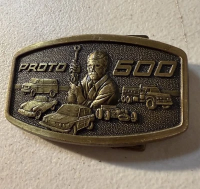 Vintage Brass Proto 500  Mechanics Commemorative  Belt Buckle 1970s MINT - Image 1 of 4
