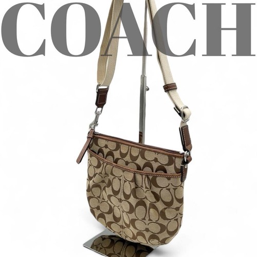 Autentica borsa a tracolla Coach beige firmata F42835 dimensioni compatte