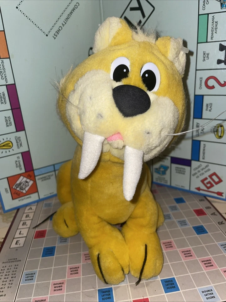 Juguete de peluche de 10" Baby Puss Saber Tooth Tiger The Flintstones 1996 Hanna Barbera  Foto 1 de 4