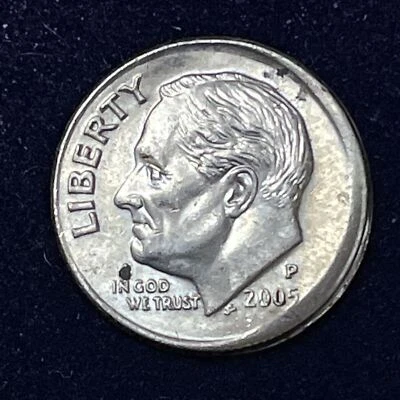 Moneda de diez centavos P Roosevelt 2005 error - descentrada #34605 Foto 1 de 2