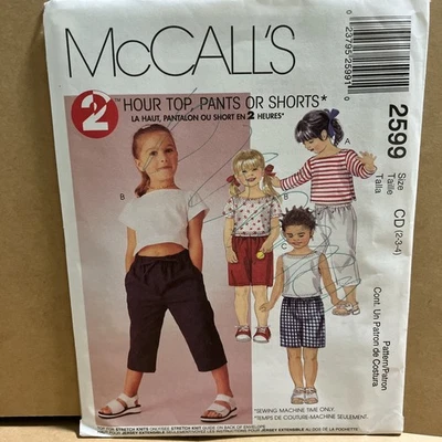 McCall's 2599 UNCUT Girls Size 2, 3, 4 Top and Pull-On Pants or Shorts Pattern - Image 1 of 4