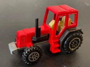 Welly 9131 Red Farm Tractor, Tan Interior, 1/64 - Picture 1 of 3