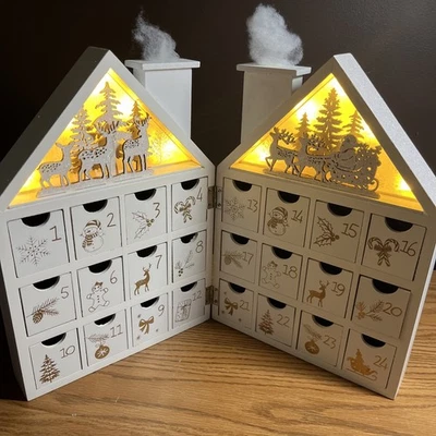 Lighted Advent Calendar Wooden House With 24 Unique Wooden Drawers with Batterie - Image 1 of 4