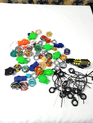 Lote mixto Beyblades con cables de más de 70 piezas en total Foto 1 de 4