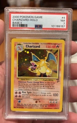 1999 POKEMON BASE SET UNLIMITED #4 CHARIZARD-HOLO PSA 7 Near Mint - Image 1 of 2
