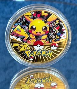 Abstract Pikachu Gold Coin - Pokemon Coin in Plastic Capsule - Rare Design - NEW - Picture 1 of 9