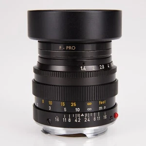 Leica Leitz WETZLAR Summilux 50 mm f/1,4 alemán V2 con capucha, filtro, tapa Ex++ - Imagen 1 de 15