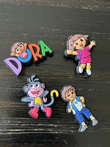 Dora Schuh Charms Zubehör Schlüsselanhänger & Armband 4 Stck. - Bild 1 von 1