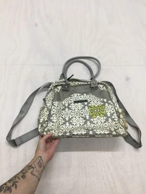 Mochila bolsa de pañales con parte inferior de pepinillo de petunia amarilla floral Foto 1 de 4