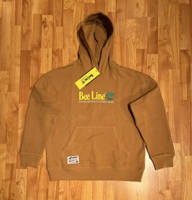 NUEVO HOMBRE PEQUEÑA TIMBERLAND X BEE LINE SUDADERA CON CAPUCHA EN TRIGO Foto 1 de 4