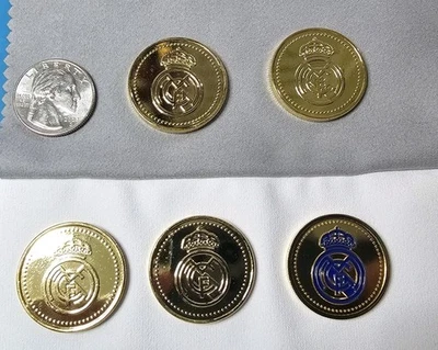 SET OF REAL MADRID SANTIAGO BERNABEU STADIUM GOLD COLORED COMMEMORATIVE COINS - Image 1 of 4