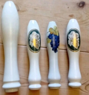 A Vintage Set Of 3 Ceramic Mini Wine  Pumps Handles 3x Grapes Pattern - Image 1 of 2