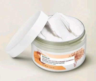 Manteca corporal batida reparadora orgánica de karité y caléndula Yves Rocher tina de 8,4 oz Foto 1 de 4