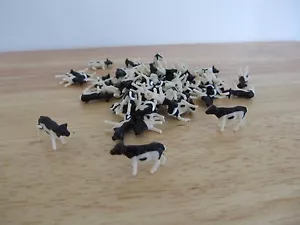 Lote de 10 terneros Holstein bebé Ertl Farm Country 1/64 - Imagen 1 de 1