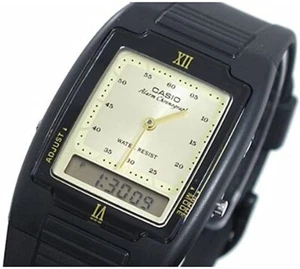 Casio AQ-47 Men's Black Yellow Gold Wristwatch - Picture 1 of 2