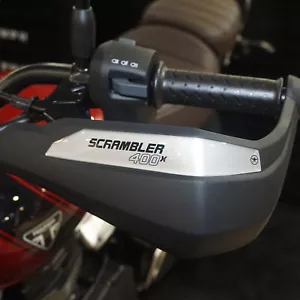 Adesivi 3D Protezioni Paramani moto compatibili con Triumph Scrambler 400 X - Foto 1 di 8