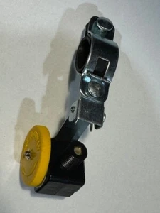 VTG OLD SCHOOL BK YELLOW BICYCLE TIRE DRIVE 4 SPEEDOMETER FORK MOUNT W/ BRACKET - Picture 1 of 4