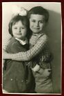 Vintage Soviet Era Photo 60s  Girl with a Bow and a Boy stand in an Embrace
