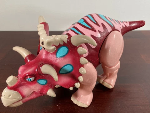 TOMY Dinosaur Train "Mayor Kosmoceratops" - Interactive Toy (2012) Jim Henson Cover