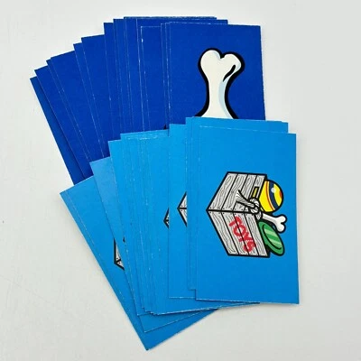 Monopoly Pedigree Dog Lover's Edition 16 trucos y golosinas 16 tarjetas de caja de juguetes para perros Foto 1 de 2