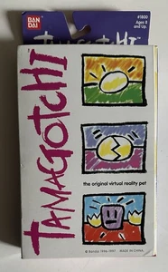 VINTAGE TAMAGOTCHI #1800 WHITE RED 1ST GEN VIRTUAL PET BANDAI 1997 NEW - Picture 1 of 4