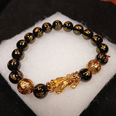 Pulsera de riqueza Feng Shui Pixiu de obsidiana y cuentas de oro Foto 1 de 4