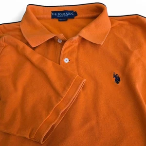 U.S. Polo Assn. Camisa polo naranja L para hombre con logotipo mangas cortas con bandas aberturas laterales - Imagen 1 de 16