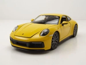 Porsche 911 (992) Carrera 4S 2019 amarillo coche modelo 1:24 Welly - Imagen 1 de 9