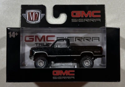 New 2024 M2 Machines R90 Target Exclusive 1998 GMC Sierra 1500 4x4 Black - Image 1 of 3