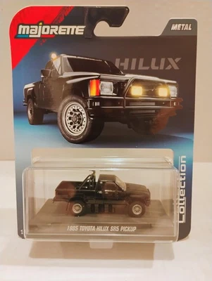 ⚡ Nueva Majorette 1:64 Collector Series 🔥 - Toyota Hilux SR5 1985 Pickup - Negra Foto 1 de 4