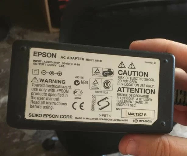 Alimentatore originale epson A110E - Immagine 1 di 1