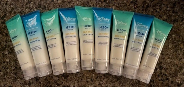 Lote de 9 • Disney Resorts H2O+ Beauty • Loción corporal de sal marina • 60 ml (2 fl oz) Ea Foto 1 de 1