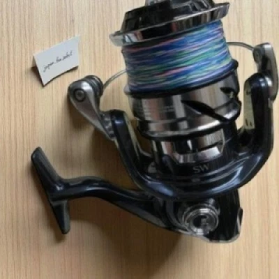 Carrete giratorio Shimano 21 TWIN POWER SW 10000HG relación de transmisión: 5,6 X-Shield Exc+++++ Foto 1 de 4