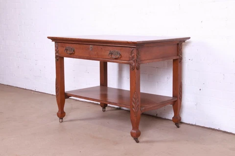 Antique Victorian Carved Oak Writing Desk or Library Table, Circa 1890s Cover