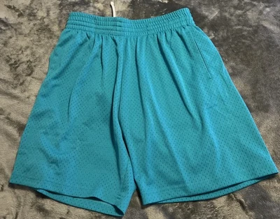 Pantalones cortos medianos de malla Mitchell & Ness para hombre Foto 1 de 4