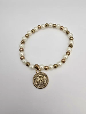 Pulsera antigua griega imitación oro moneda dije tono blanco y dorado elástica ENVÍO GRATUITO $ Foto 1 de 4