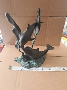 Arte escultura de delfín y becerro pátina bronceada de latón internacional de San Pacífico 7" - Imagen 1 de 13