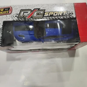 New Bright  Ford Mustang  GT Battery RC Sports Car, Blue - Picture 1 of 5