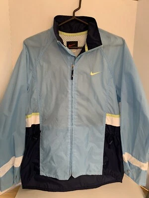 Chaqueta de lluvia vintage Nike para mujer talla mediana azul logotipo de pista bloque de color Foto 1 de 4