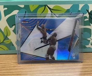2020 WWE Finest Ricochet #27 Blue Paraellel 001 / 150 - Picture 1 of 2