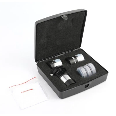 Kit de accesorios Celestron AstroMaster de 1,25 pulgadas lente Barlow y ocular y filtro lunar Foto 1 de 4