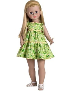 Robert Tonner She's a sign of summer in her cotton print sundress and sandals - Picture 1 of 1