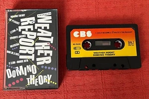 WEATHER REPORT - CASSETTE TAPE - DOMINO THEORY - WITH PAPER LABELS - Picture 1 of 4