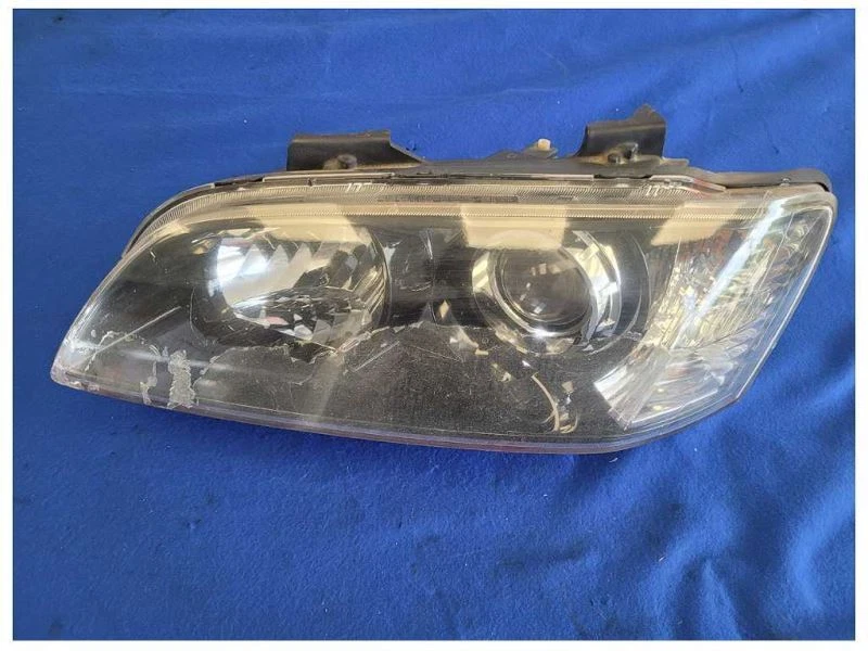 Lámpara de faros delanteros para conductor Pontiac G8 2008-2009 sedán 6,0 L V8 *pestañas de freno* 2529 Foto 1 de 4