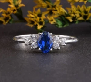 Silver ring with centre sapphire colour & clear stones genuine bargain size 62 - Picture 1 of 5